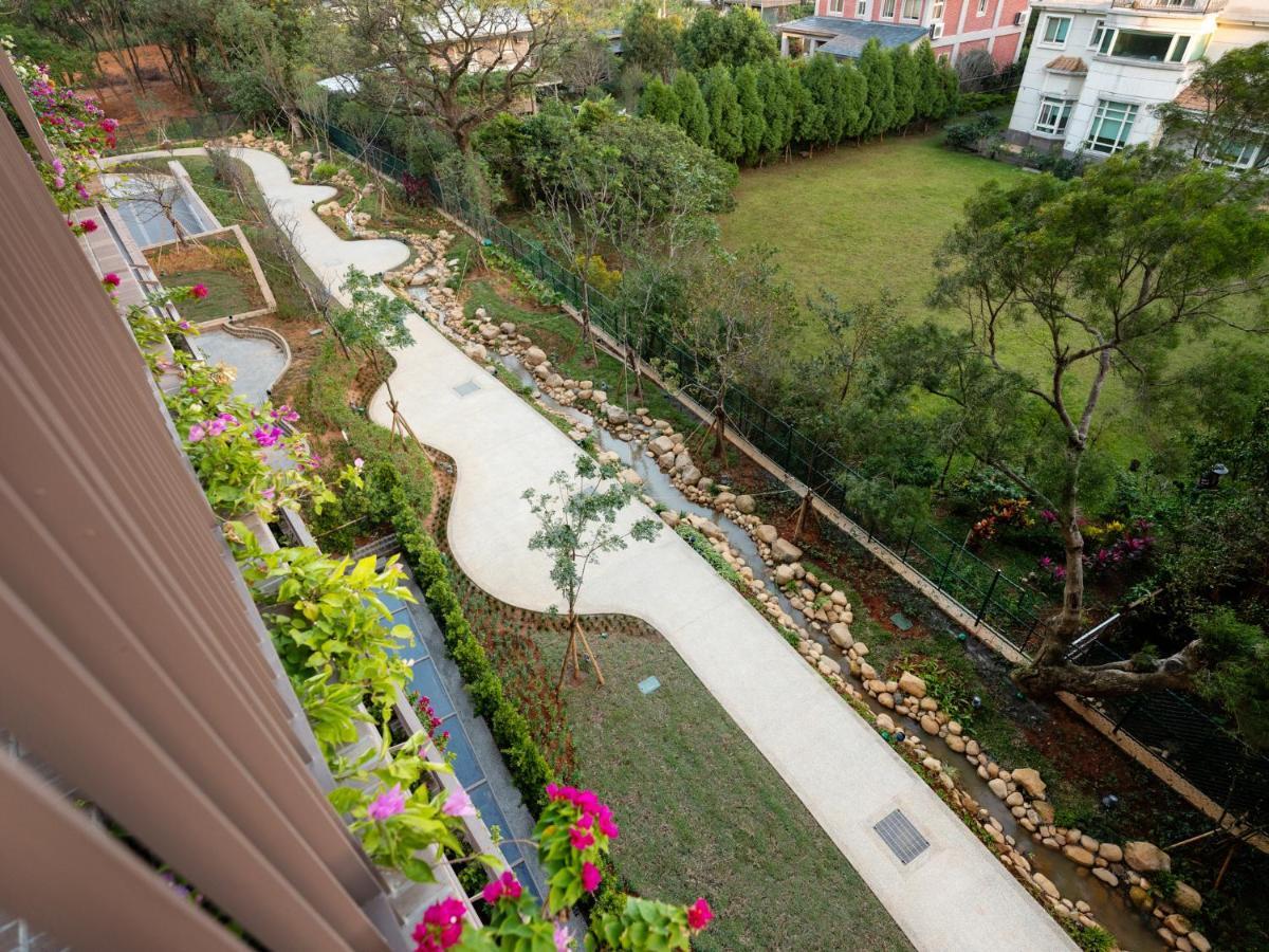 Fame Hall Garden Hotel Longtan Exterior photo The park