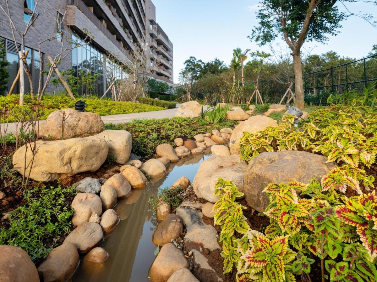Fame Hall Garden Hotel Longtan Exterior photo The campus of the University of Jinan