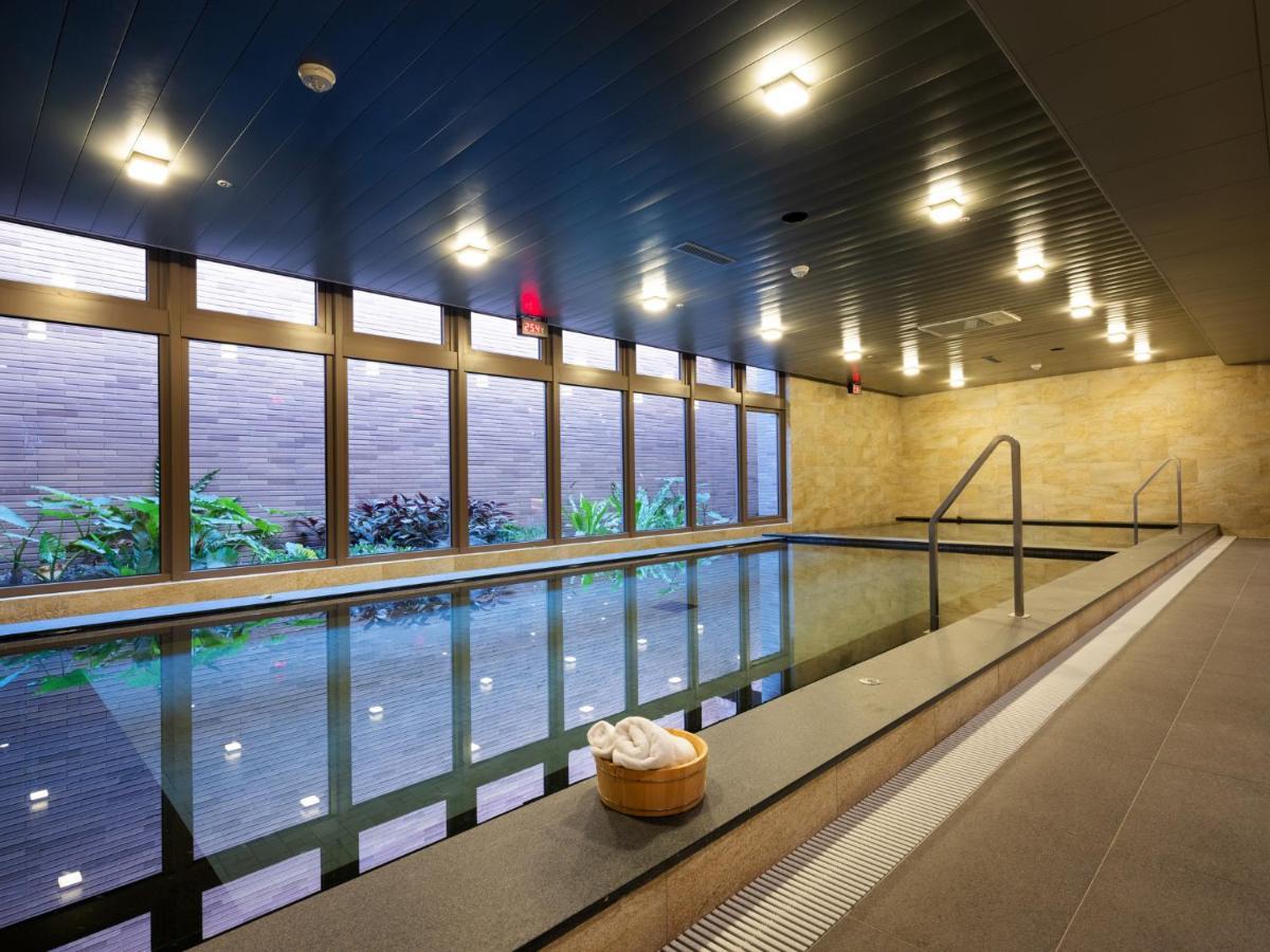 Fame Hall Garden Hotel Longtan Exterior photo The indoor pool at the hotel