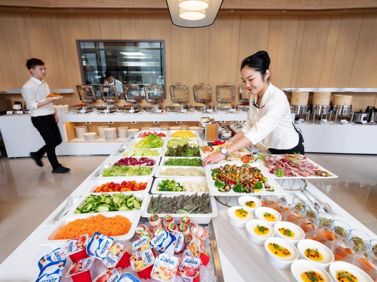 Fame Hall Garden Hotel Longtan Exterior photo A salad bar