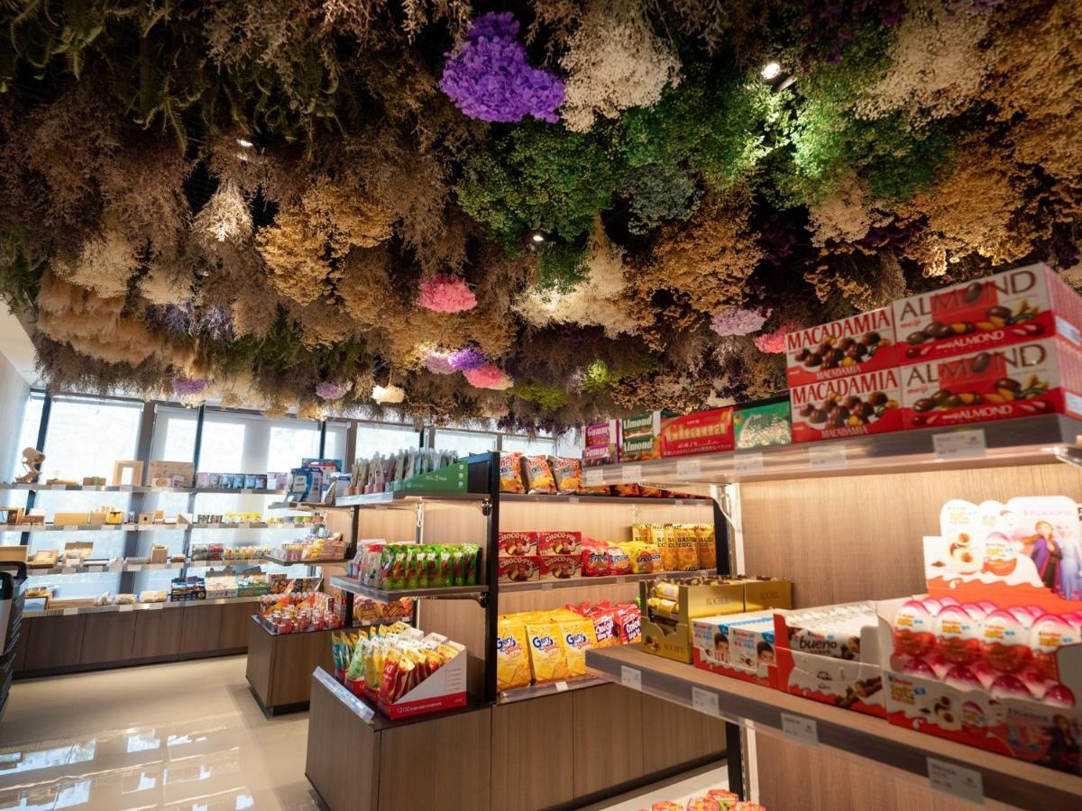 Fame Hall Garden Hotel Longtan Exterior photo The interior of a typical store